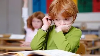 كيف أعلم ابني الكتابة والقراءة