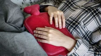 أعراض الدورة الشهرية وآلامها