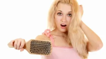 ما العلاج لتساقط الشعر